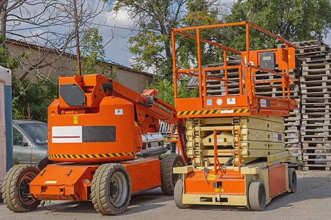 warehouse forklift in action with neatly arranged pallets in Cheswold DE